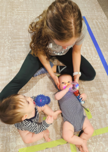 Ms. Karli, a pediatric physical therapist, treats a baby.